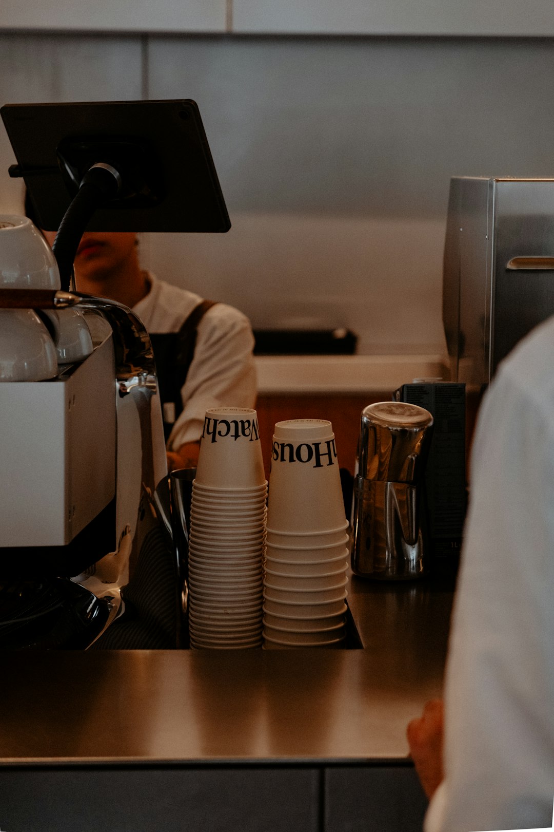 stack-of-coffee-cups-at-a-cafe-counter-8retptxtffs